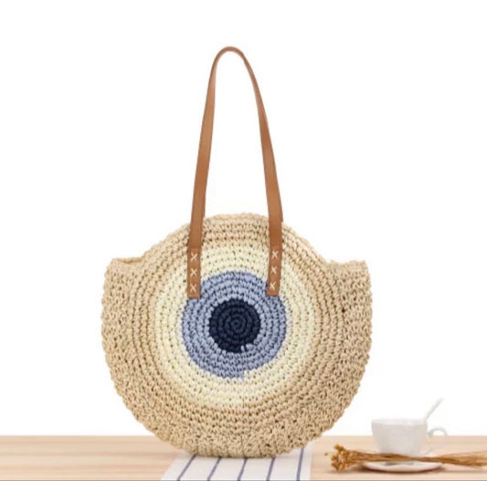 Handwoven Round Straw Bag with Evil Eye Design